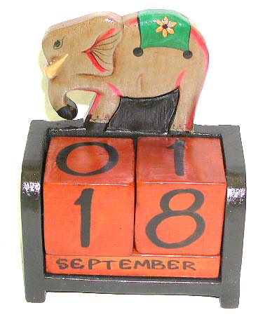 Wood working - color painted elephant design wooden calendar.