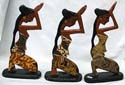 Assorted color tribal woman in pray abstract carving stand