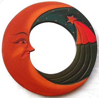 Dark blue rounded wooden mirror with tan moon and shooting star decor 