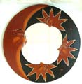 Rounded wooden mirror with tan moon 3 sun and star on black sky design