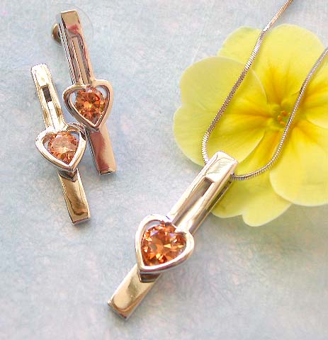Cz jewelry supplier presenting chain necklace, orange cz heart love long strip pendant and stud earring set
