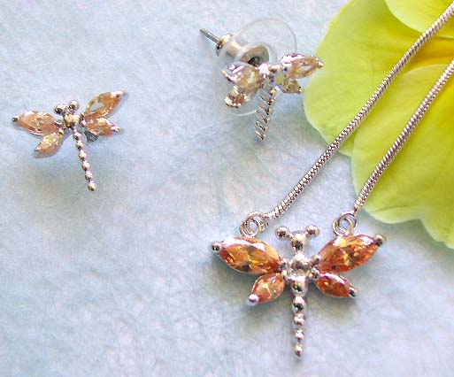 Wholesaler's dragonfly jewelry online presenting chain necklace, orange cz dragonfly pendant and stud earring set