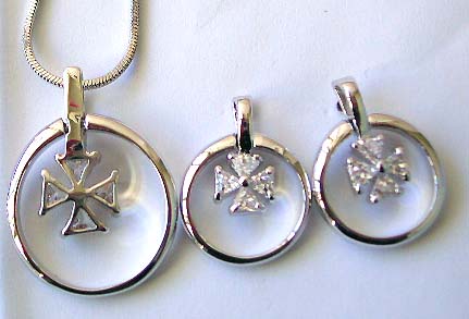 Direct imported religious jewelry catalog offering chain necklace, clear cz cross-in -circle pendant and stud earring set