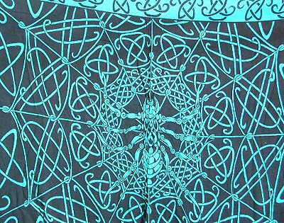 celtic design resort warparound. Batiked rayon beachwear sarong with scorpio seated in his web base center