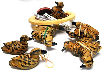  9 individually carving swans with metal windchime