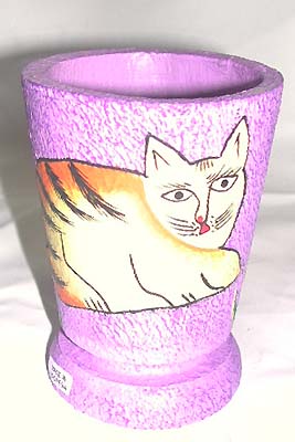 Kitchen appliances - purple painted cup with a cat figure on surface