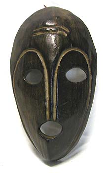 Indonesia mask - black mask with empty eyes, mouth and carving lines on forehead