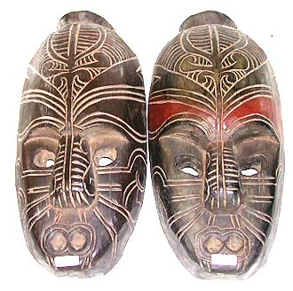 Primitive pattern - assorted color mask with carving line all over and empty eye holds (some with red paint onforehead) 
