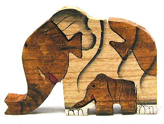 Handcrafted nature product - color painted wooden puzzle of elephant