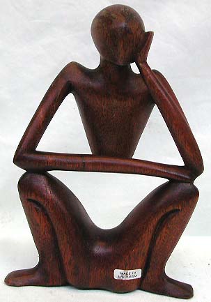 Comteporary craft work -abstract yogi man in sitting position with one hand cross on knee and one hand holding his head