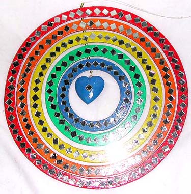 Assorted color circle wooden mobile with assorted pattern design rotating center 