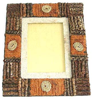 Large rectangular wooden photo frame with swirling pattern decor around edge