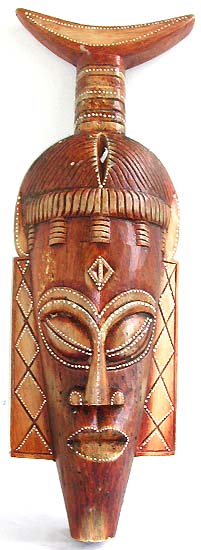 Brown narrow down wooden mask with fish tail top and long ears