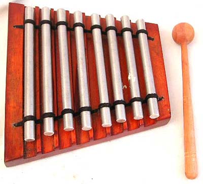 Wooden musical instrument with stick