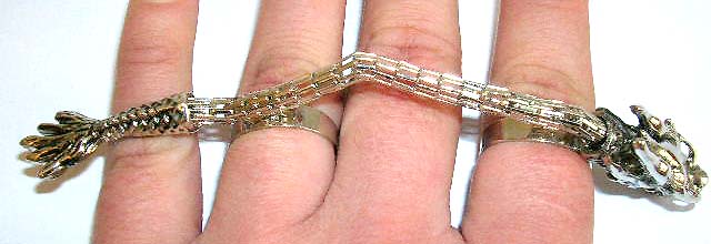 Fashion slave ring in mystic dragon pattern design with mini red cz embedded on eyes         