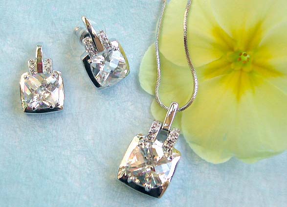 Wholesale catalog costume jewelry offering chain necklace, rounded clear cz top decor pendant and stud earring set