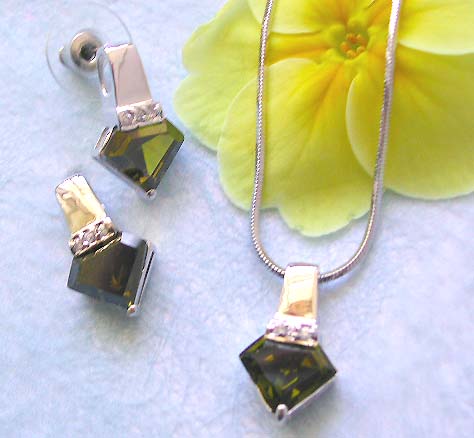 Cz jewelry online shop presenting chain necklace, green diamond cz pendant and stud earring set